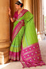 Charming Optic Green Woven Patola Silk Saree with Classic Border