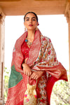 Luxuriant Off-White Woven Patola Silk Saree with Classic Border