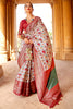 Luxuriant Off-White Woven Patola Silk Saree with Classic Border