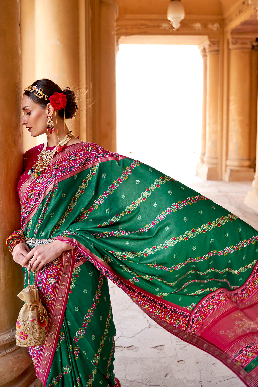 Leaf Green Woven Patola Silk Saree with Classic Border