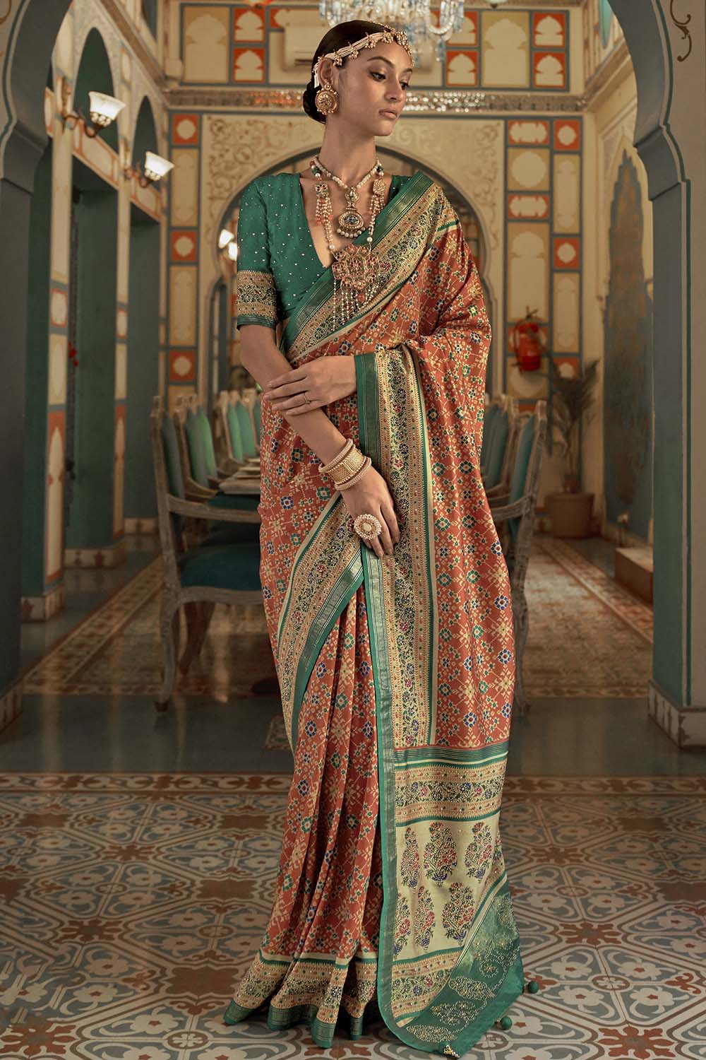 Orange Smooth Patola Silk Saree With Zari Weaving Work