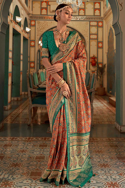 Orange Smooth Patola Silk Saree With Zari Weaving Work