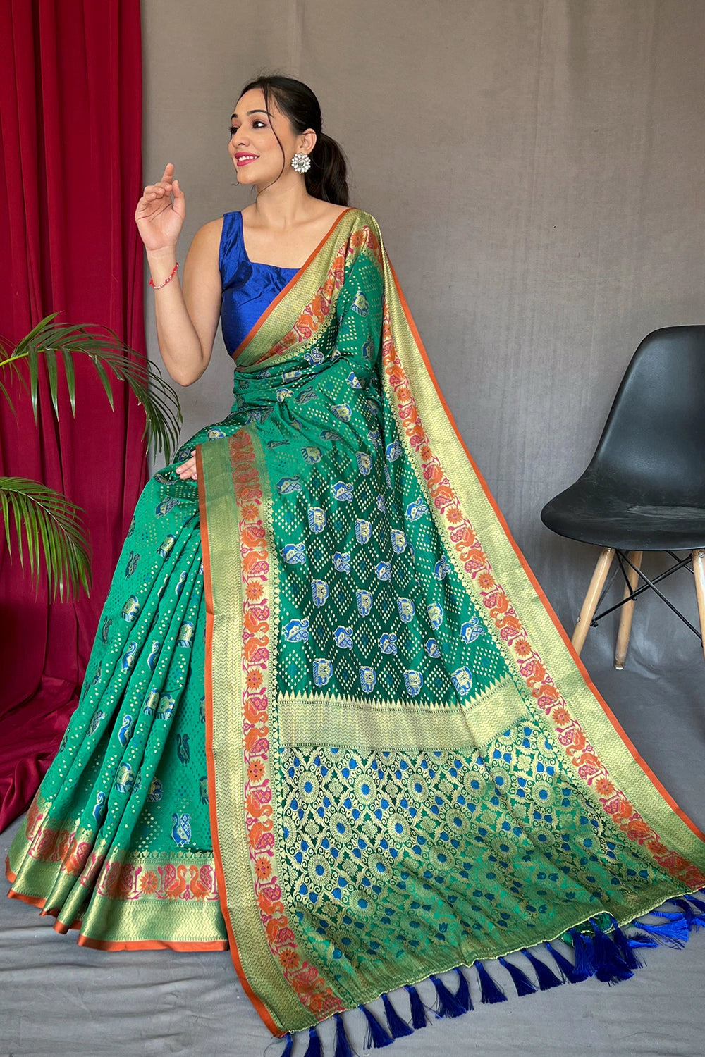 Teal Green Patola Silk Saree With Zari Weaving Work